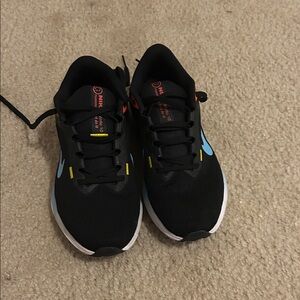 Nike Black Sneakers with Blue and Yellow Accents